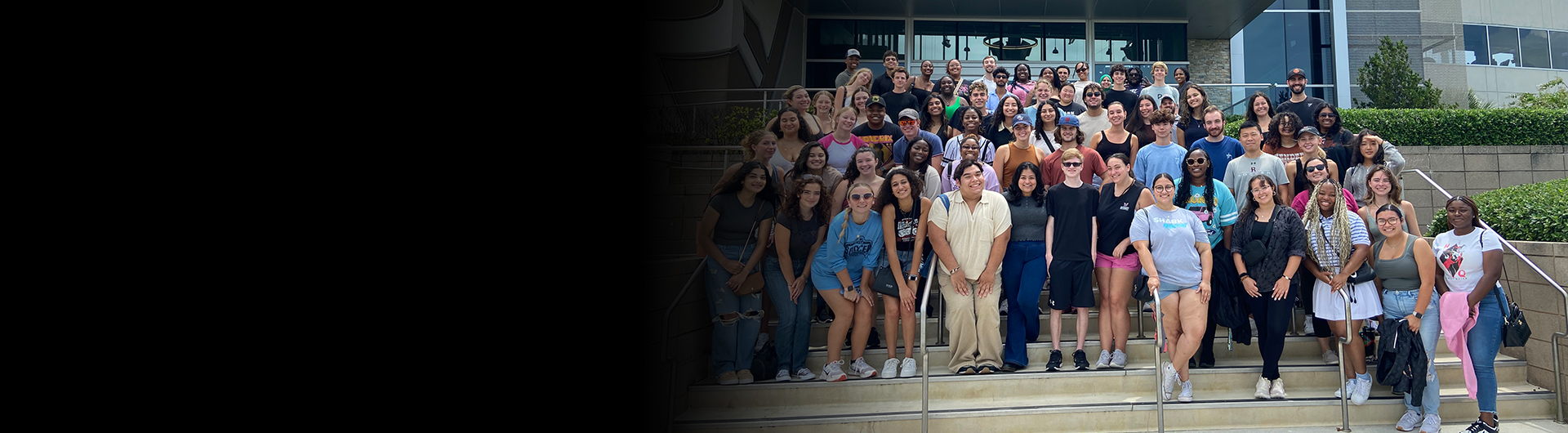 group of housing assistants gathered for a photo