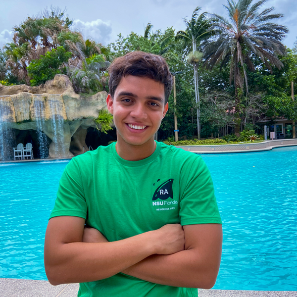 photo of an RA Student in front of a pool